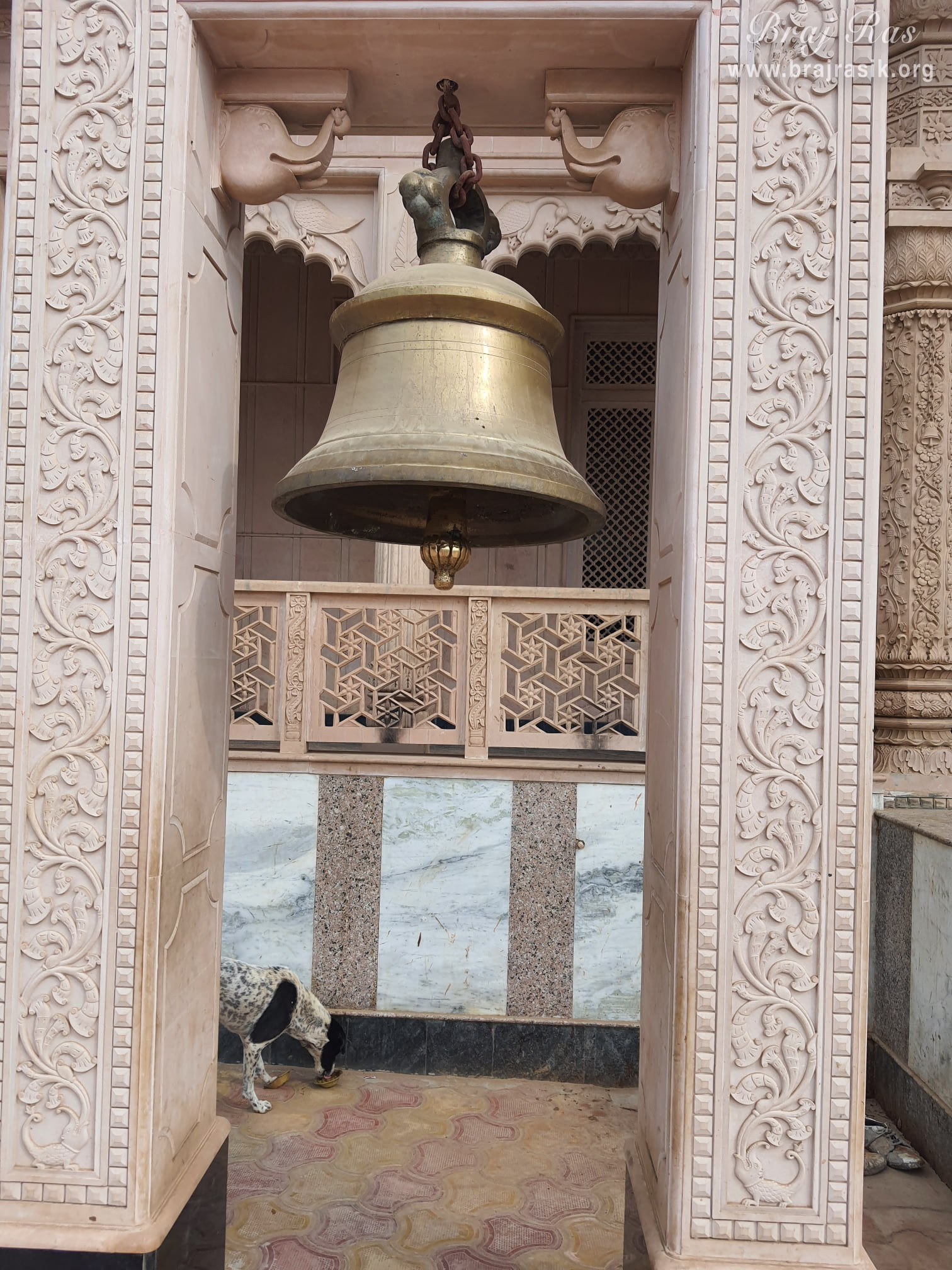A bell is hanging in the temple of Punchari Ka Lautha in Govardhan.