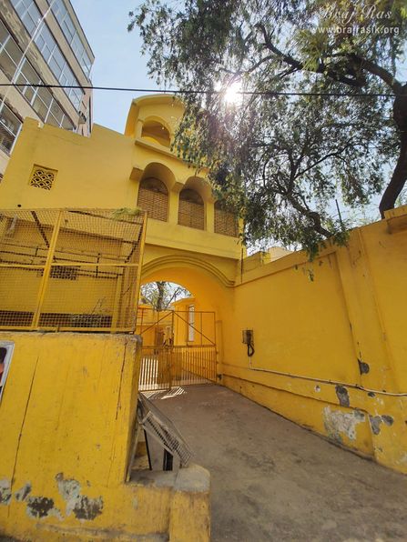 Distant view of the entrance gate of Shri Radha Tila in Vrindavan.