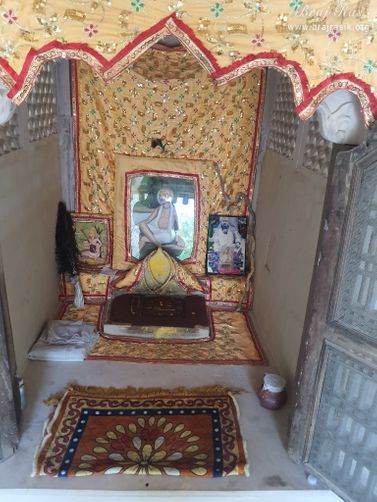 Inside view of the bhajan place of Swami Bhagwat Rasik Dev Ji at Radha Bavdi in Vrindavan.