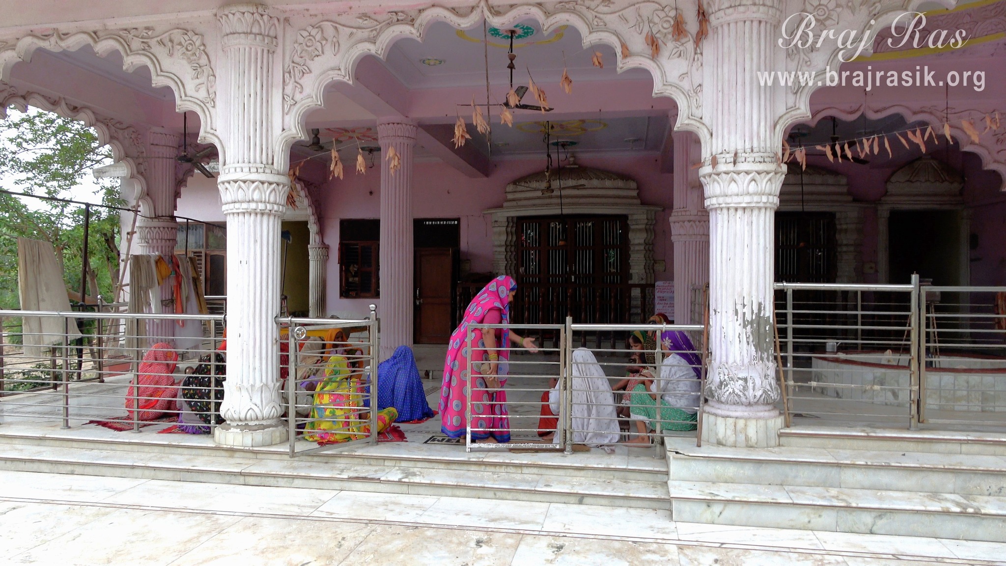 Devotees doing Sankirtan in the temple of Mother Yashoda and Shri Krishn at Yashoda Kund and Hau Bilau in Nandgaon.