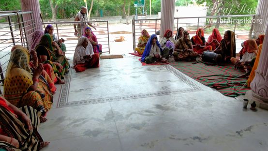 Devotees doing kirtan in the temple of Mother Yashoda and Shri Krishn at Yashoda Kund and Hau Bilau in Nandgaon.