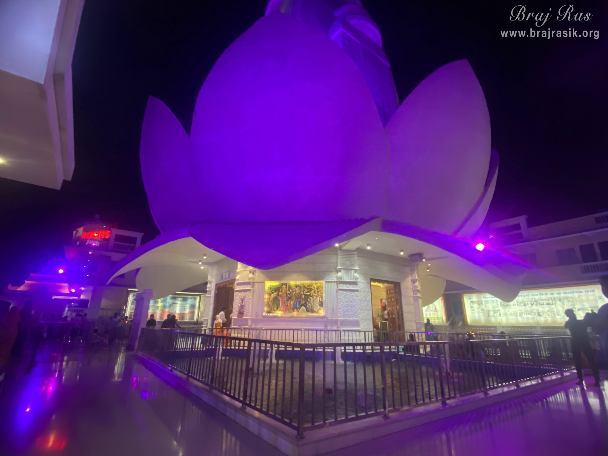 Cross view of Shri Priyakant Ju Temple with purple lighting in Vrindavan.