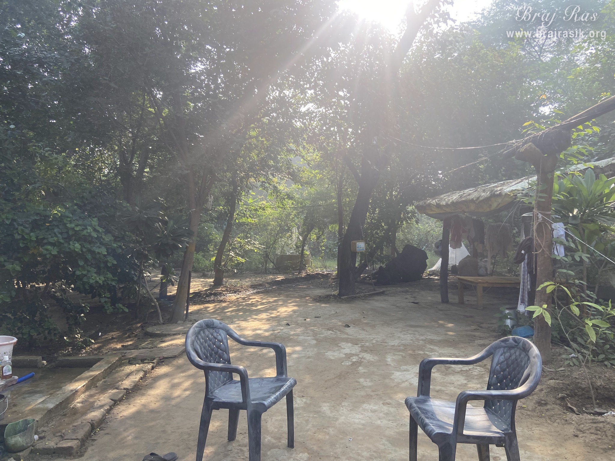 A calm view of outside the bhajan kutir of a sadhu in Vanshivat.