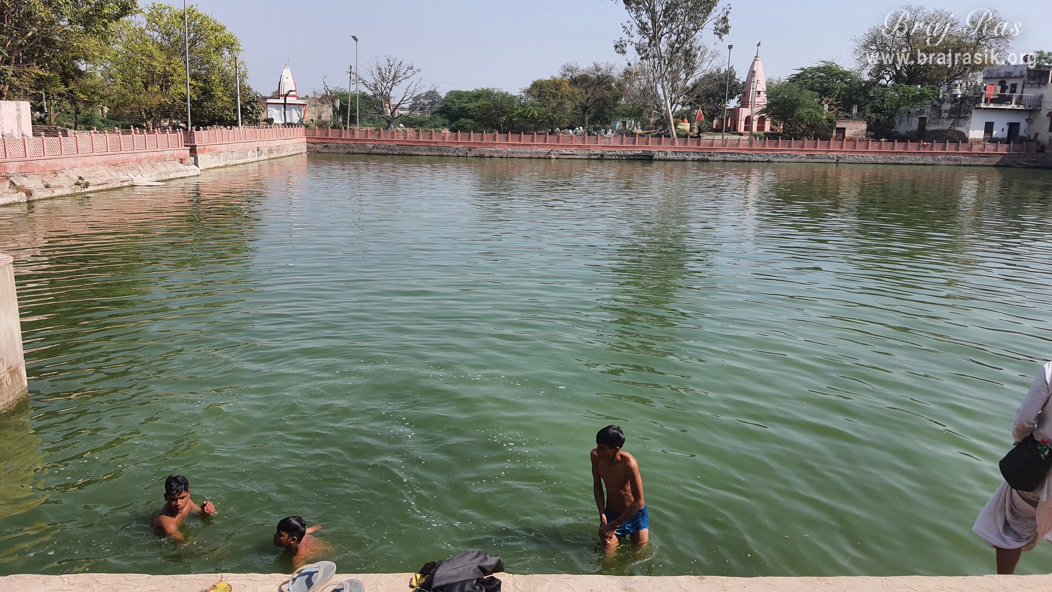 Devotees taking bath in Krishn Kund in Madhuvan - Braj.