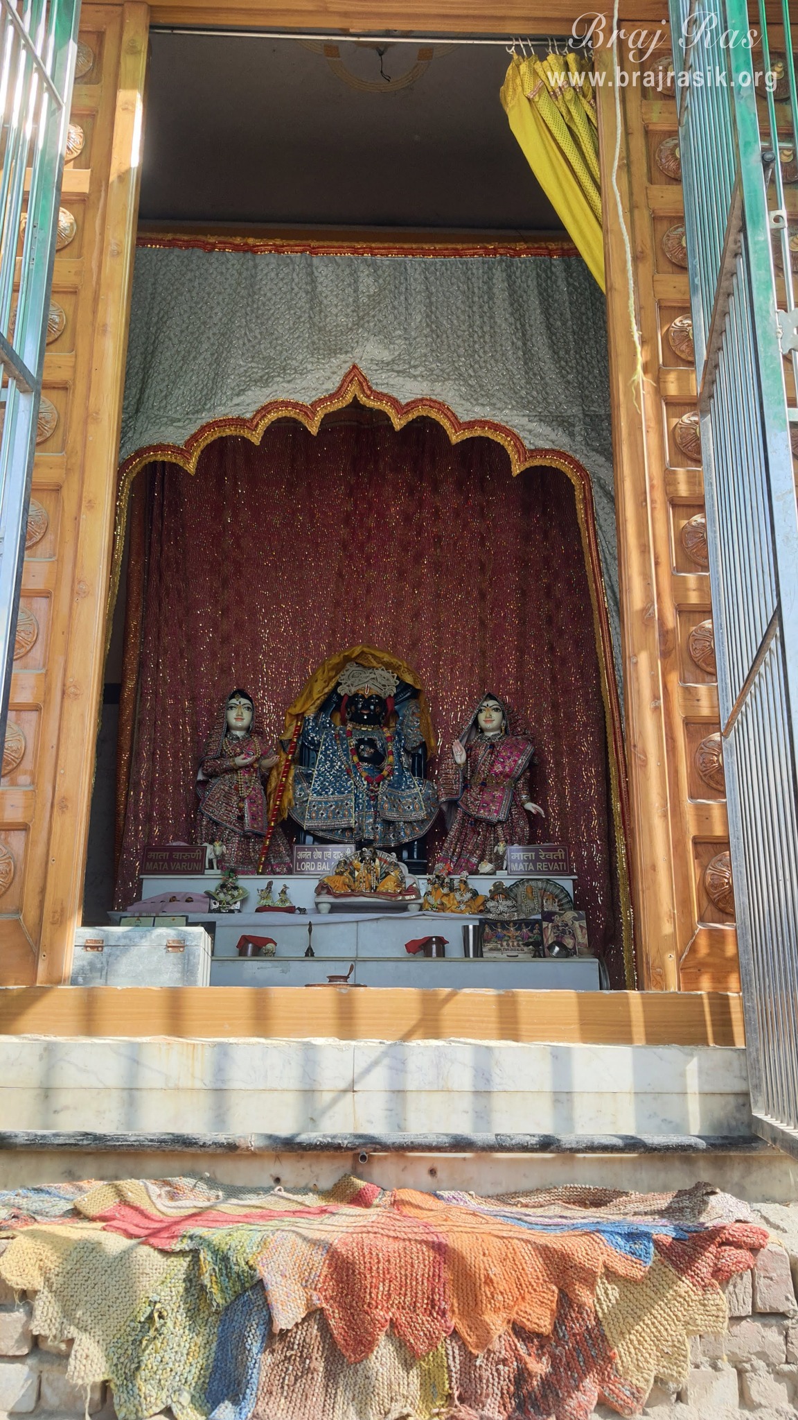 Darshan of Shri Dauji (Lord Balram) in middle, Mother Revati in the left, and Mother Varuni in the right in Madhuvan - Braj.
