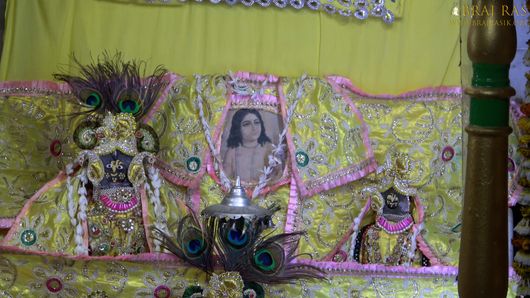 Darshan of Shri Radha Krishn along a picture of Shri Chaitanya Mahaprabhu inside Shri Bhagwat Niwas, Vrindavan