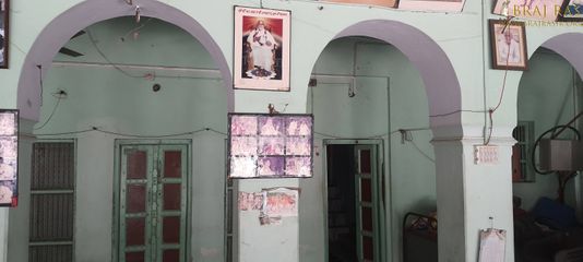 A silent view of the photos of the divine Saints who lived in Bhagwat Niwas, Vrindavan.