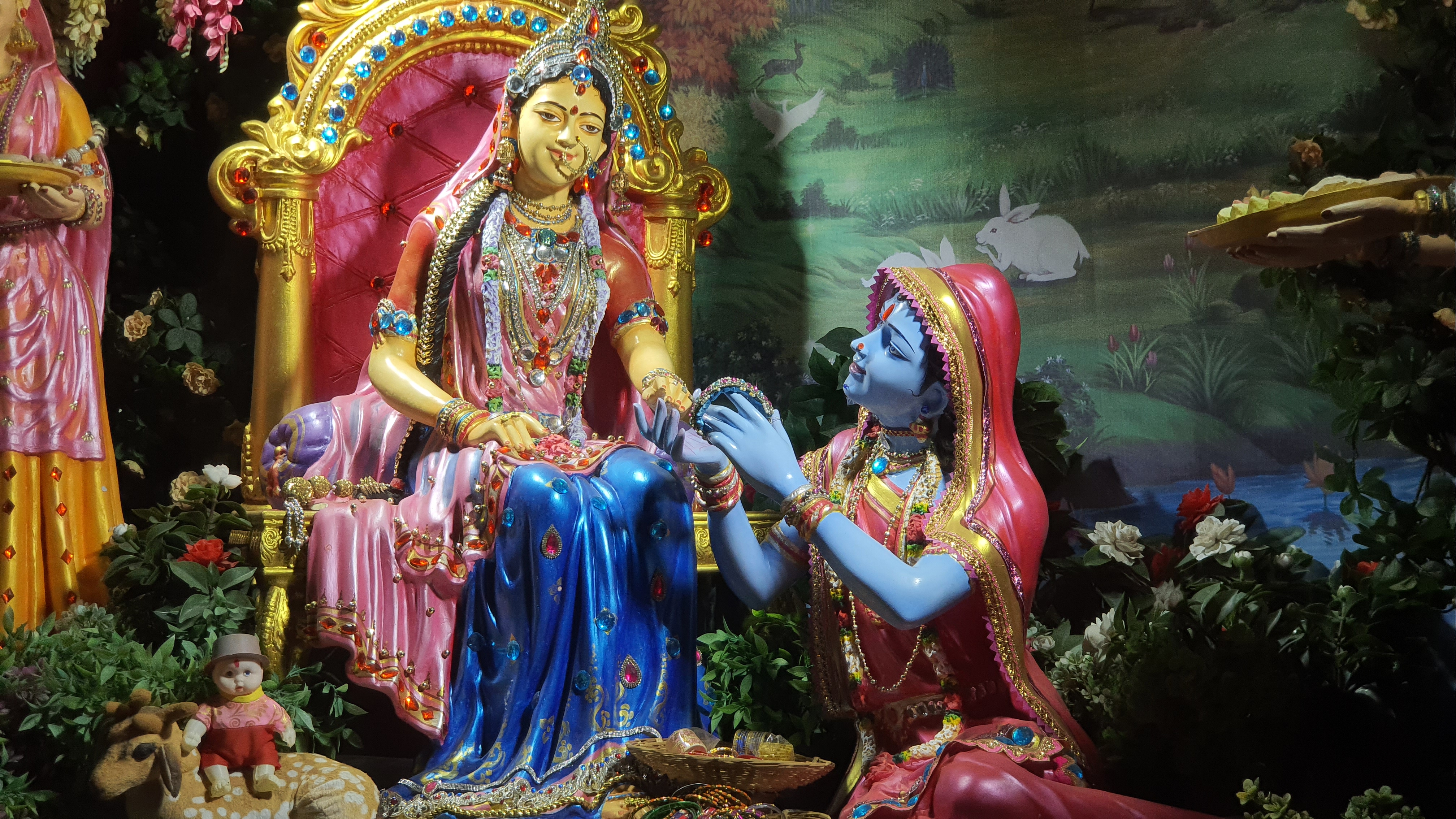 Shri Krishna disguised as a Sakhi, serving Sri Radha at Kirti Mandir, Barsana