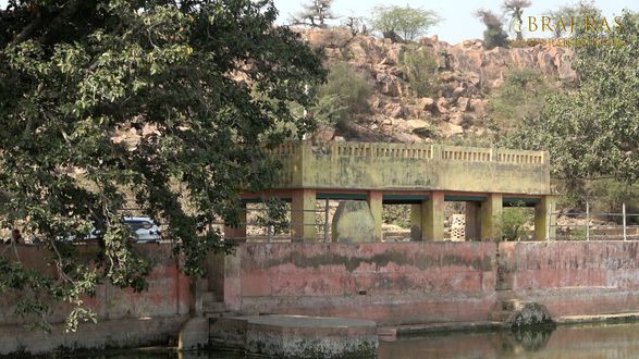 A nice view of Govardhan Hill behind Govind Kund, Govardhan.