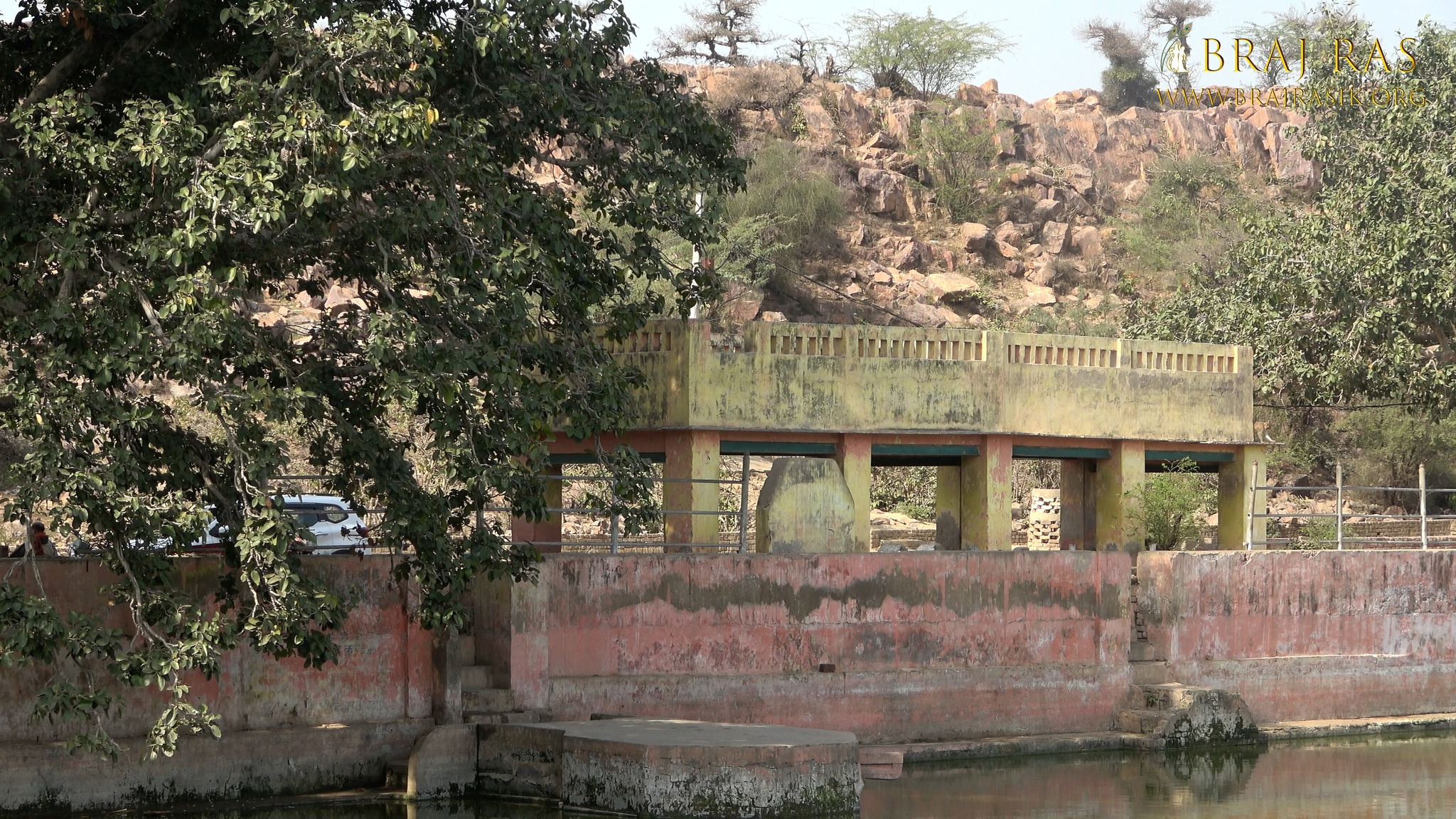 A nice view of Govardhan Hill behind Govind Kund, Govardhan.