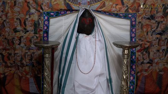 Darshan of Shrinathji in a form of Govardhan Shila at Shrinathji Prakatya Sthal, Govardhan.