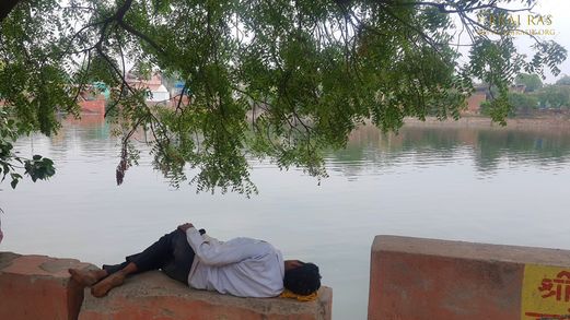 A man is resting at Bahulavan Kund.