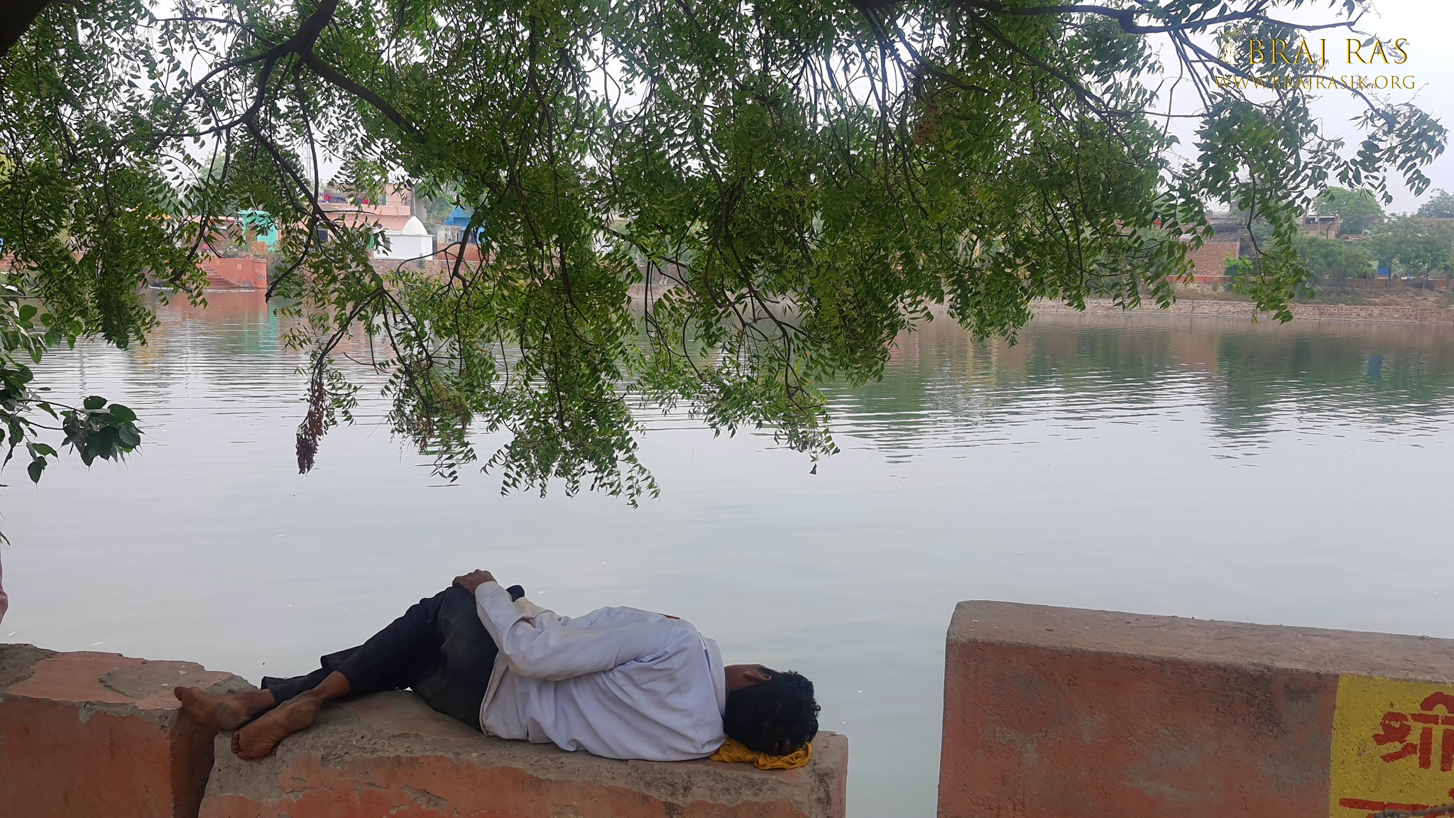 A man is resting at Bahulavan Kund.