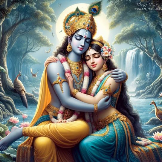 The divine couple, Sri Radha and Krishna, embracing each other, in the midst of forest bowers in Vrindavan alongside the riverbank.