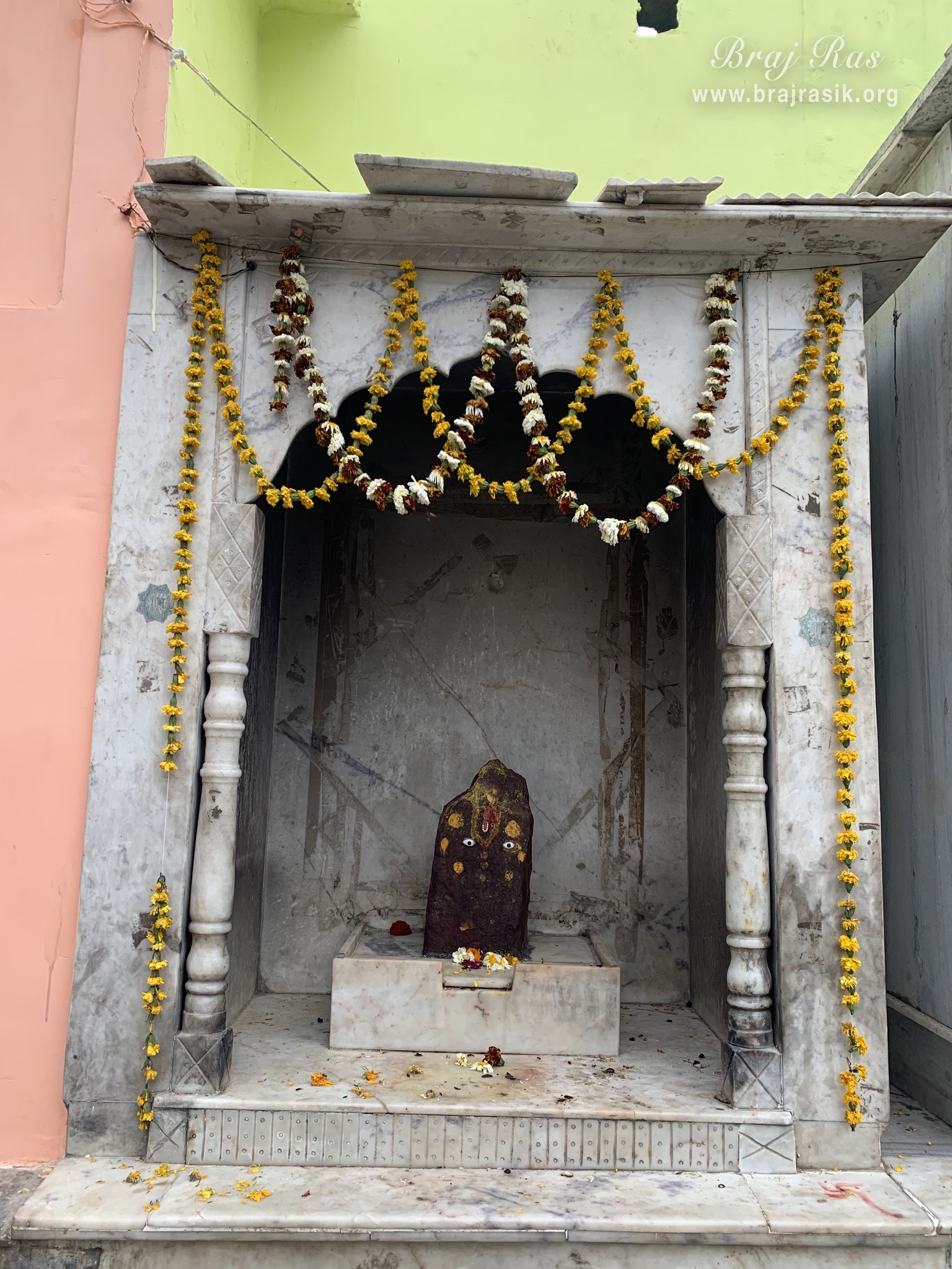 Distant darshan of Lord Giriraj Govardhan at Garud Govind Temple near Vrindavan.
