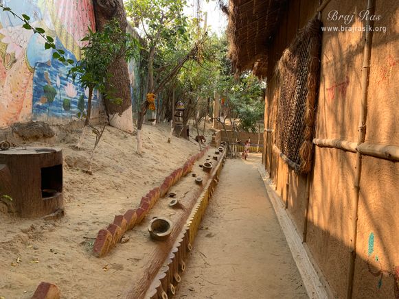 View of the parikrama path of a Kunj inside Nikunj Van at Shri Anandam Dham, Vrindavan.