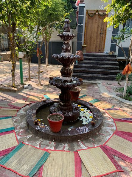 View of a fountain inside Nikunj Van at Shri Anandam Dham, Vrindavan.