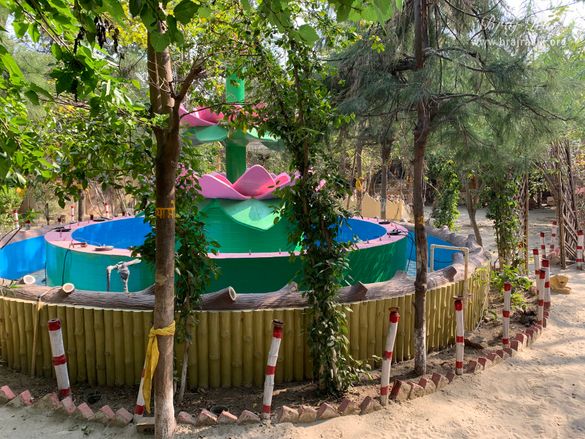 View of a beautiful fountain inside Nikunj Van at Shri Anandam Dham, Vrindavan.