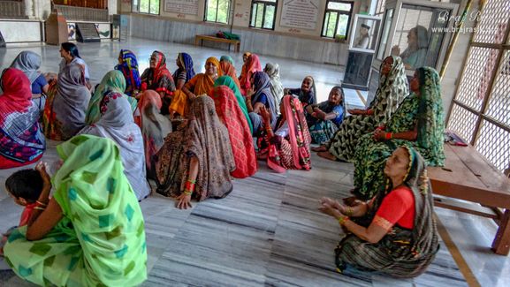 Devotees doing sankirtan in the temple at the birthplace of Shri Hita Harivansh Mahaprabhu in Baad Gram, Mathura.