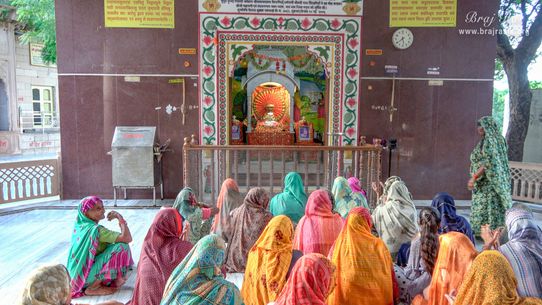 Devotees doing Sankirtan in the temple of Shri Radha Naam Sewa at the birthplace of Shri Hita Harivansh Mahaprabhu in Baad Gram, Mathura.