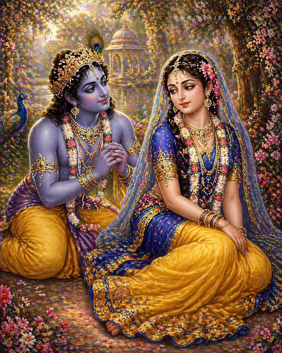 यमुना जी के शांत जल के तट पर विराजमान, श्री राधा रानी लज्जावश अपनी दृष्टि नीचे किए हुए हैं, जबकि श्री कृष्ण हाथ जोड़े उनके अत्यंत समीप बैठे हैं और उनकी प्रसन्नता पाने के लिए कोमलता से अनुनय-विनय कर रहे हैं; और उनके चारों ओर का संपूर्ण पुष्पित कुंज उनके इस मधुर एवं प्रेममयी आदान-प्रदान के वातावरण में अत्यंत सुंदरता से सराबोर हो उठा है।